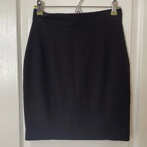 Mid length black skirt